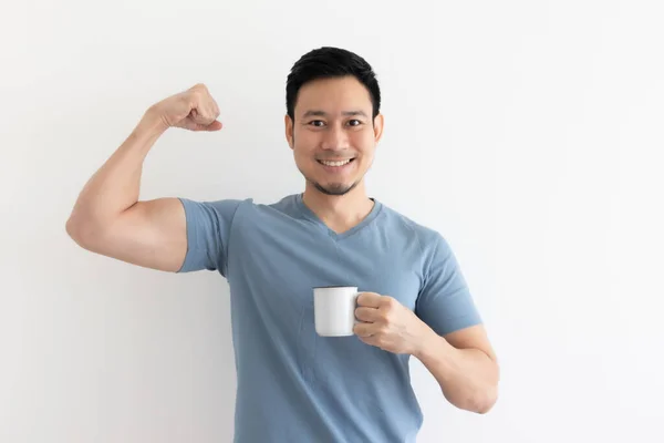 Happy healthy man drinks healthy coffee on isolated background. — Stock Photo, Image