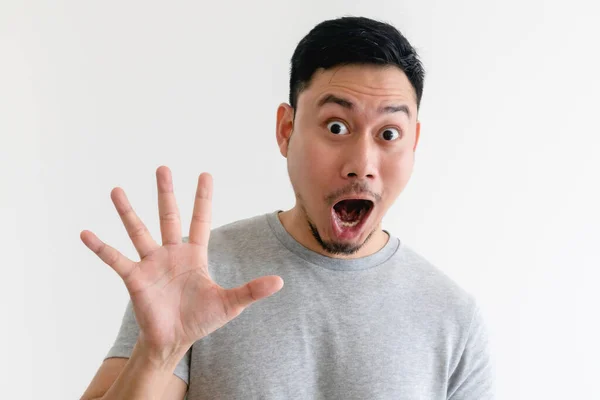 Surprised face man making number hand sign on isolated white background. — Stock Photo, Image