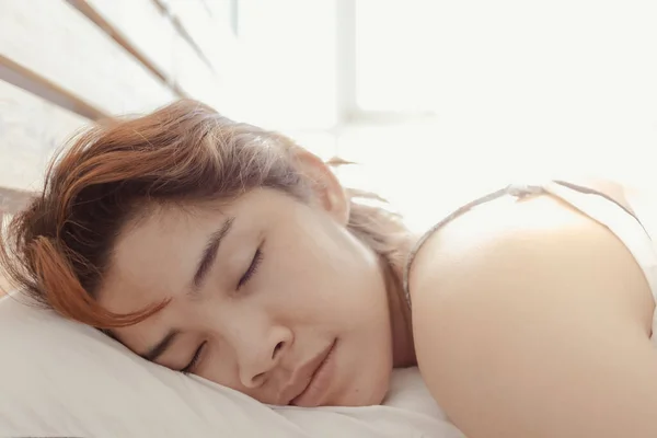 Close up of woman sleep on her white bed. Concept of sleepy. — Stock Photo, Image