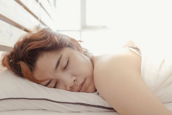 Close up of woman sleep on her white bed. Concept of sleepy. — Stock Photo, Image