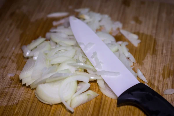 Chopped onion and ceramic knife