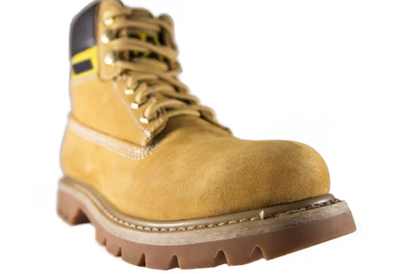 Grote gele schoenen met ruwe zolen en veters — Stockfoto