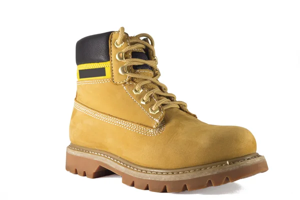 Grote gele schoenen met ruwe zolen en veters — Stockfoto