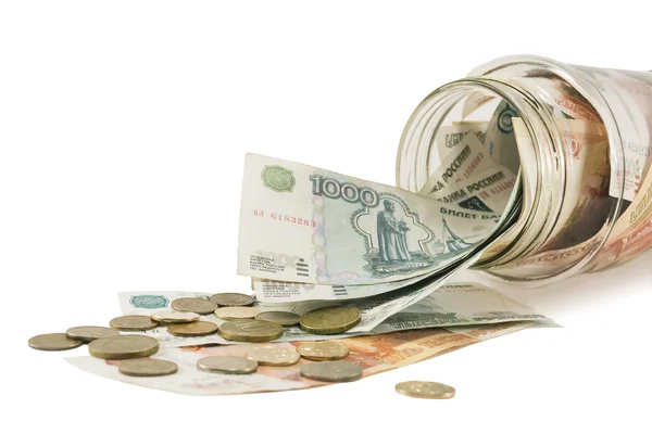 Банк с деньгами, долларами, евро и разбросанными монетами — стоковое фото