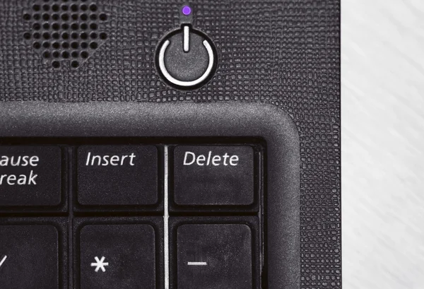 Laptop keyboard with delete button in black and white — Stock Photo, Image