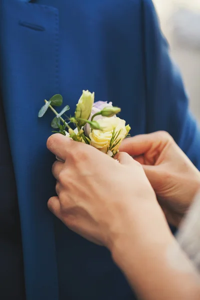 Buttonhole on a blue jacket — Stock Photo, Image