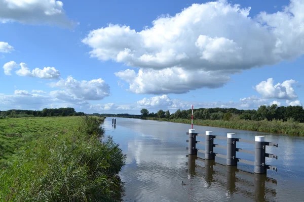 White clouds over river Oude IJssel — Stock Photo, Image