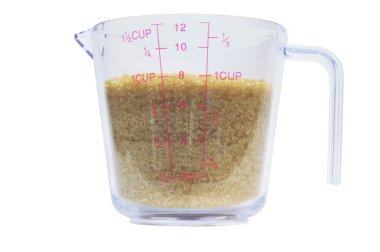 Measuring Cup with sugar 1 clipart