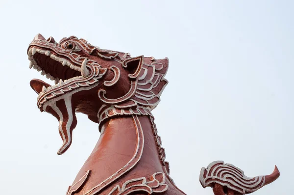 Head and tail of a lion statue. — Stock Photo, Image