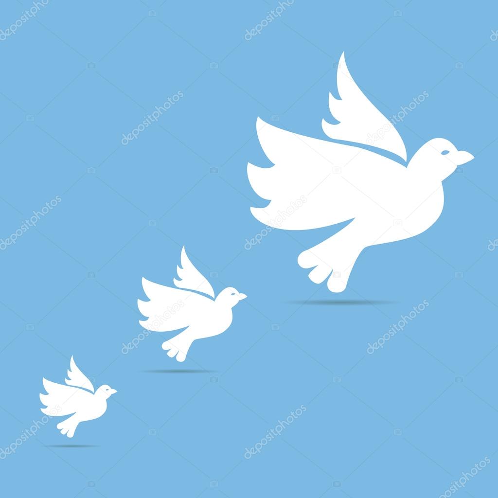 Four white doves of peace flying up