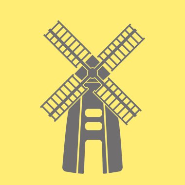 Sarı bir arka plan üzerinde yel değirmeni