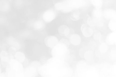 Bokeh efektli soyut arkaplan. Beyaz renklerde bulanık odaklı ışıklar, soyut beyaz bulanık arkaplan. Bokeh Noel 'i güzel, parlak Noel ışıklarını bulanıklaştırdı