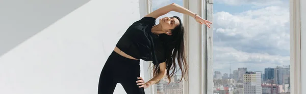 Young Armenian Woman Black Sportswear Doing Side Lunges Window Banner — Stock Photo, Image