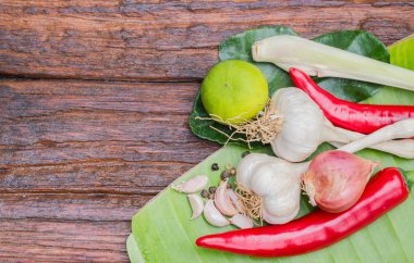 Set of herbs on wood board