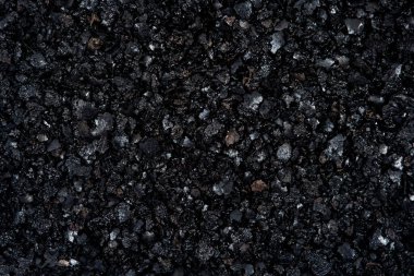 Siyah desenli soyut arkaplan üst görünümü.