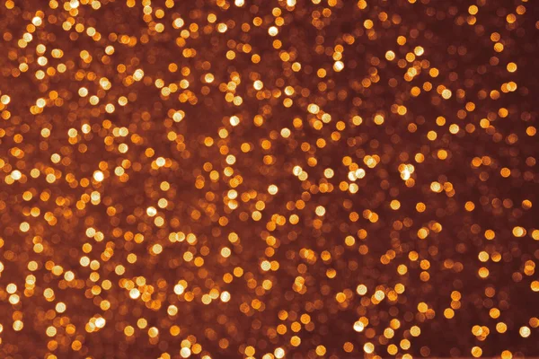 Abstract golden color dot defocused bokeh background. Holiday festive concept. — ストック写真
