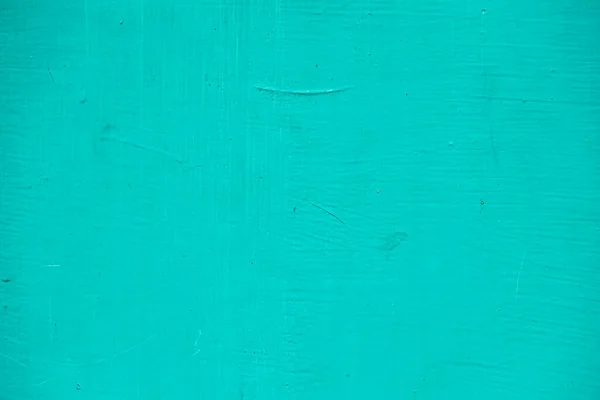 Tyrkysově malované hrubé texturované pozadí — Stock fotografie
