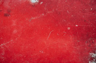 Çatlaklar ve çiziklerle yaşlanmış kırmızı yıpranmış metal arka plan