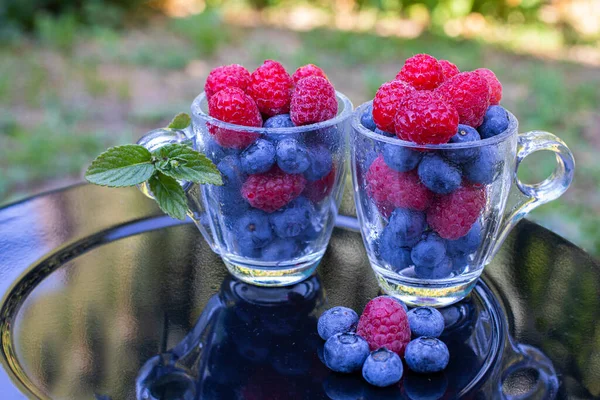 Raspberries Blueberries Transparent Cups Garden — Stock Photo, Image