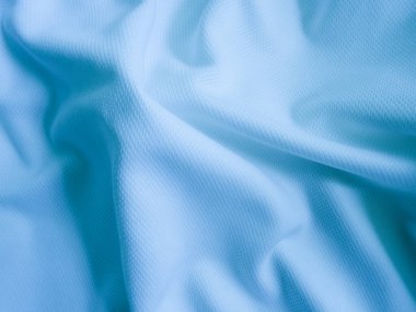 Mavi kumaş arka plan. Dalgalı kumaş dokusu