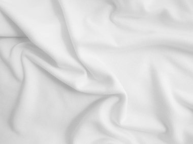 Dalgalı kumaş. Beyaz buruşuk kumaş arkaplan