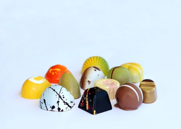 Groep van kleurrijke chocolade bonbons met verschillende smaak Stockafbeelding