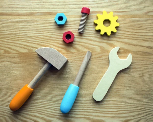 Set Colored Wooden Toy Tools Wooden Background — Stock Photo, Image