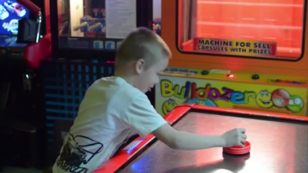 Boy Playing Air Hockey Game Machines — Stock Video