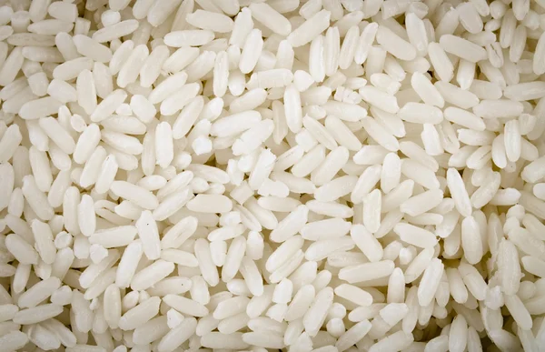 Basmati de arroz branco cozido, textura de fundo, alimentos cozidos — Fotografia de Stock