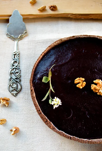 Homemade chocolate cream tart with blackberry jelly and walnuts — Stock Photo, Image
