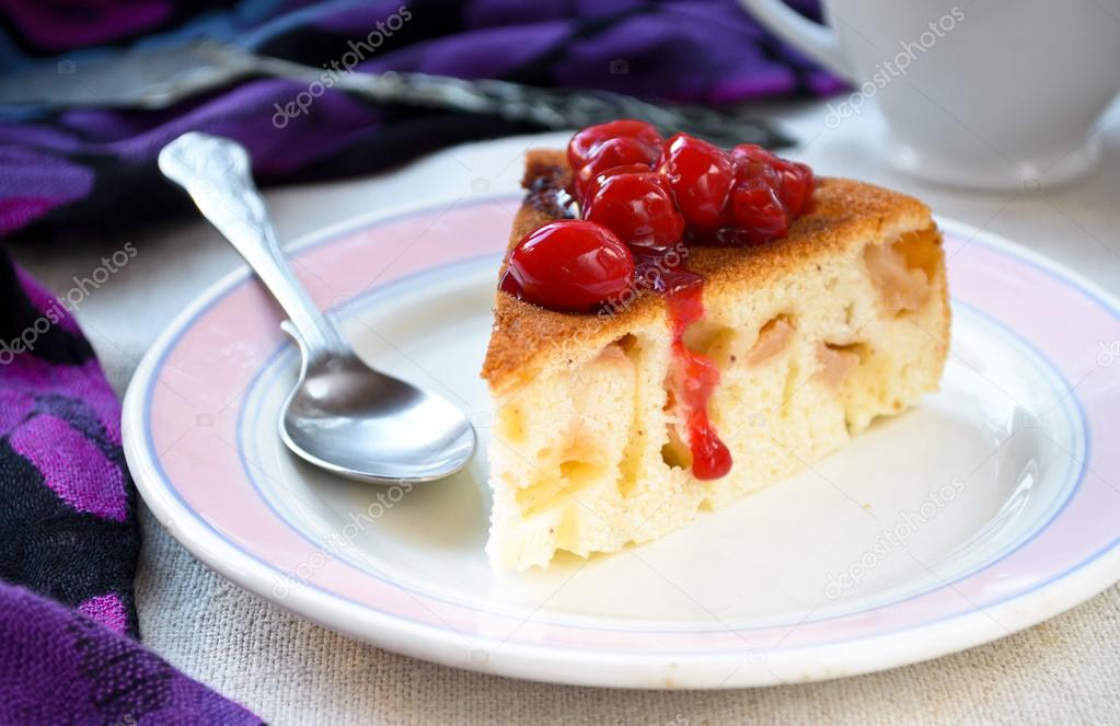 fresh apple charlotte cake with cherries in plate