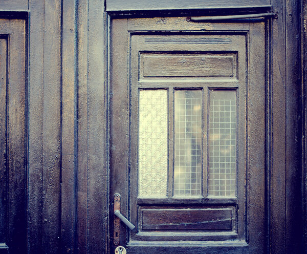 The old vintage wooden doors, grunge facade