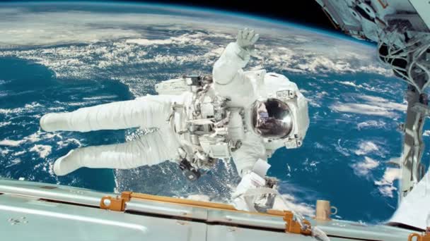 Астронавт, беручи за ПКД в місії — стокове відео