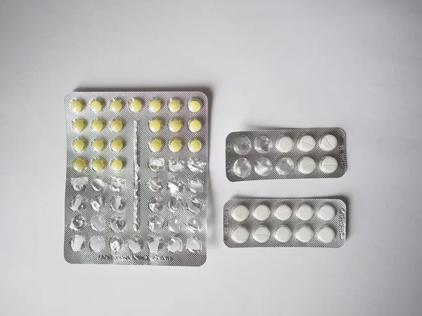 a handful of pills, from depression, sleeping pills, immunity. telemedicine doctor attached medications