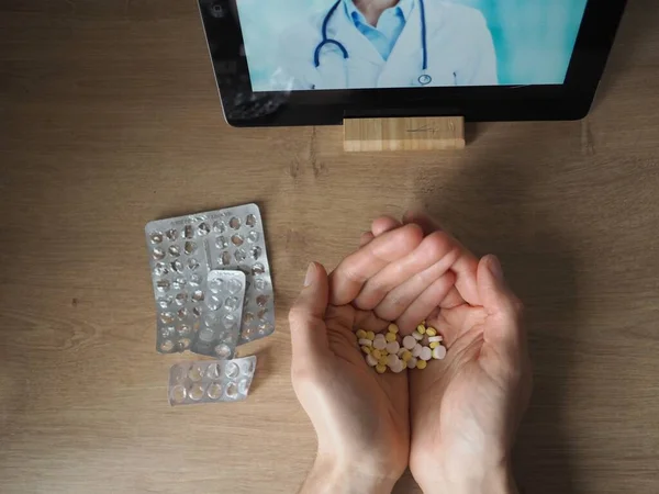 a handful of pills, from depression, sleeping pills, immunity. telemedicine doctor attached medications
