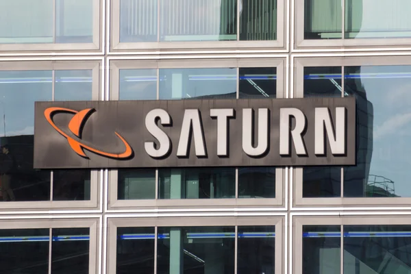 Saturn store logo on building facade — Stock Photo, Image