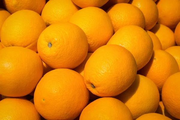 Апельсинові фрукти - помаранчевий фон — стокове фото
