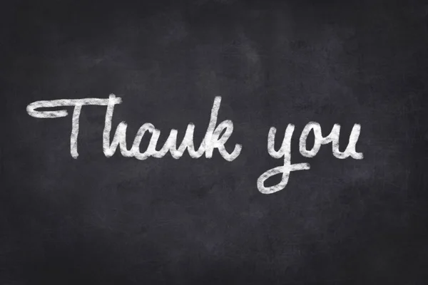 Thank you - white text on black chalkboard — ストック写真