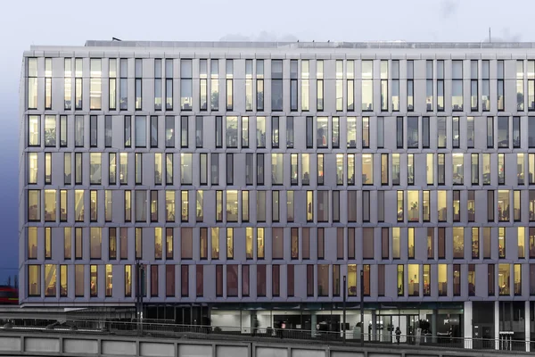 modern office building facade at night
