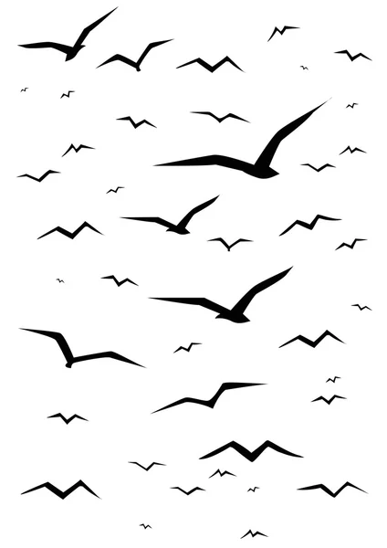 Simple black seagull silhouettes — Stock Vector