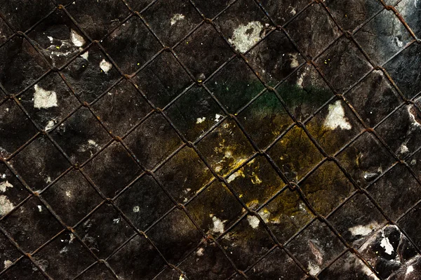 Textur der alten Grunge Black Wall mit Metallgitter — Stockfoto