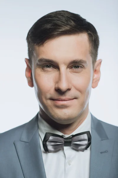 Portrait of a elegant handsome business man on white background — Stock Photo, Image