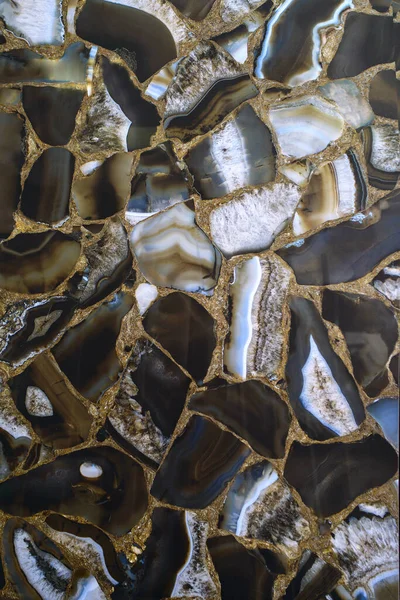 Yüksek çözünürlüklü doğal taş dokusu olan porselen bir taş. Doğal taş siyah renk, doğal akik jeot.