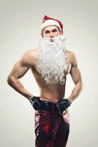 Muscular handsome sexy Santa Claus