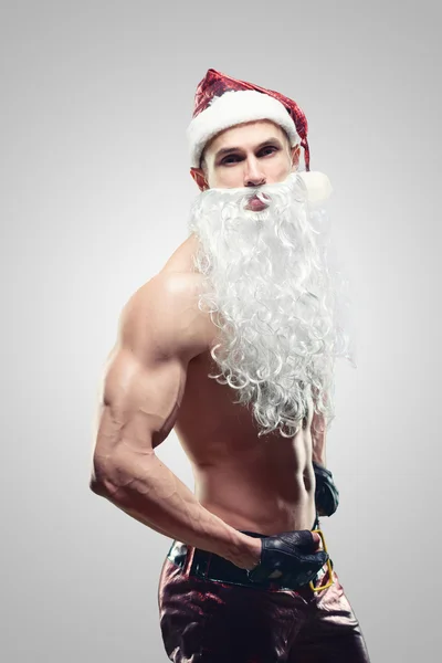 Muscular handsome sexy Santa Claus