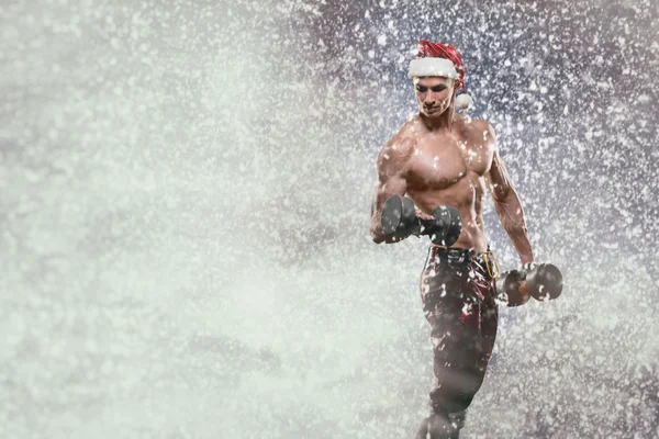 Muskulös hübsch sexy weihnachtsmann claus — Stockfoto