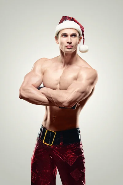 Muscular handsome sexy Santa Claus — Stock Photo, Image