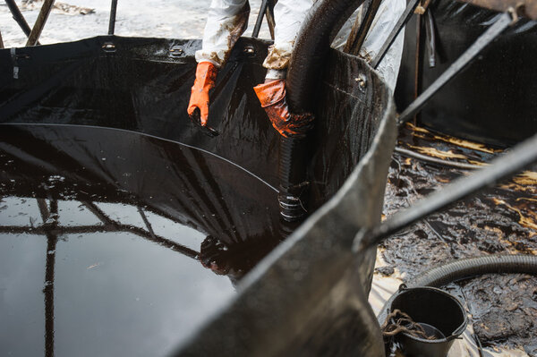 crude oil on oil spill accident on Ao Prao Beach at Samet island
