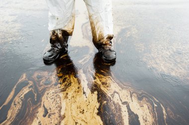 crude oil on oil spill accident on Ao Prao Beach at Samet island clipart