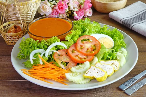 Halal salad. Thailand traditional Islamic Salad, fresh vegetable and Tofu served with Massaman curry salad dressing. Selective focus